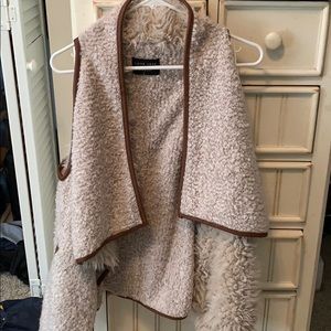 Tan with brown leather trip fur vest!